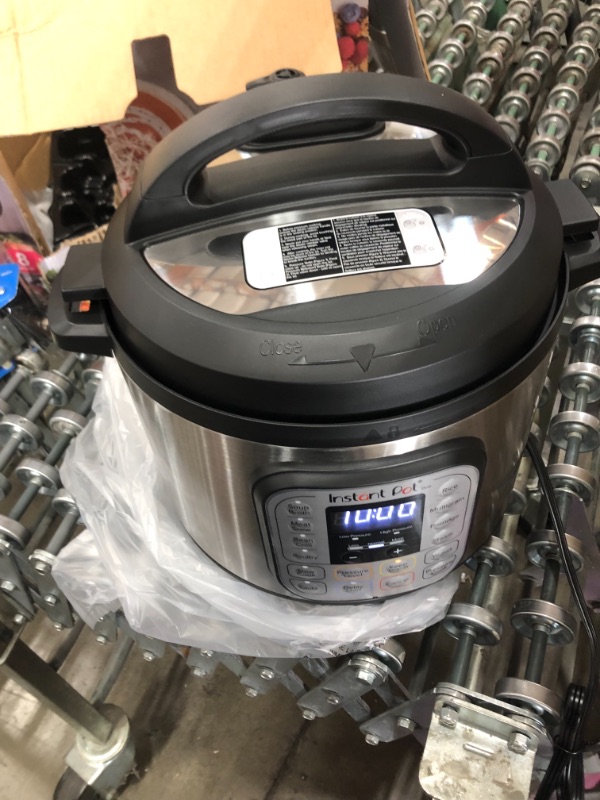 Photo 1 of Instant Pot Duo 7-in-1 Electric Pressure Cooker, Slow Cooker, Rice Cooker, Steamer, Sauté, Yogurt Maker, Warmer & Sterilizer, 8 Quart, Stainless Steel/Black