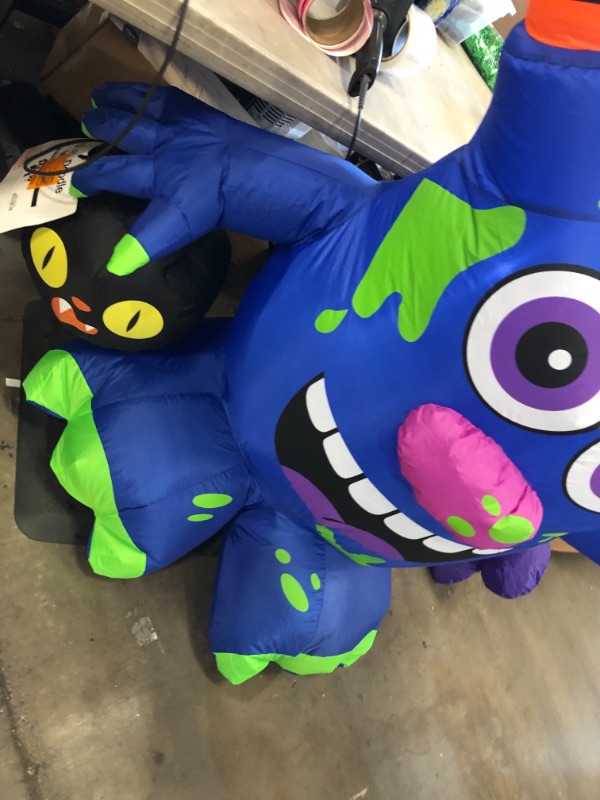 Photo 3 of 4.5 ft. Doodle Monster with Candy Bucket Airblown Halloween Inflatable
