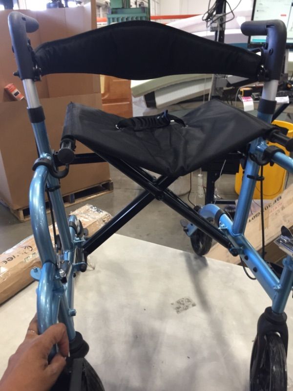 Photo 2 of portabe light weight wheelchair