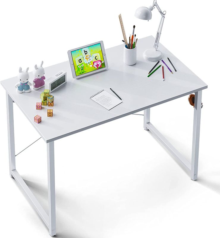 Photo 1 of ODK Computer Writing Desk 31 inch, Sturdy Home Office Table, Work Desk with A Storage Bag and Headphone Hook, White + White Leg
