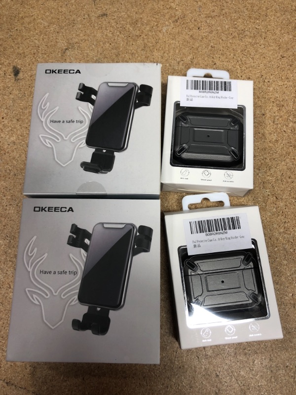 Photo 1 of BUNDLE OF PHONE AND EAR BUD HAOLDERS
2 OF EACH

