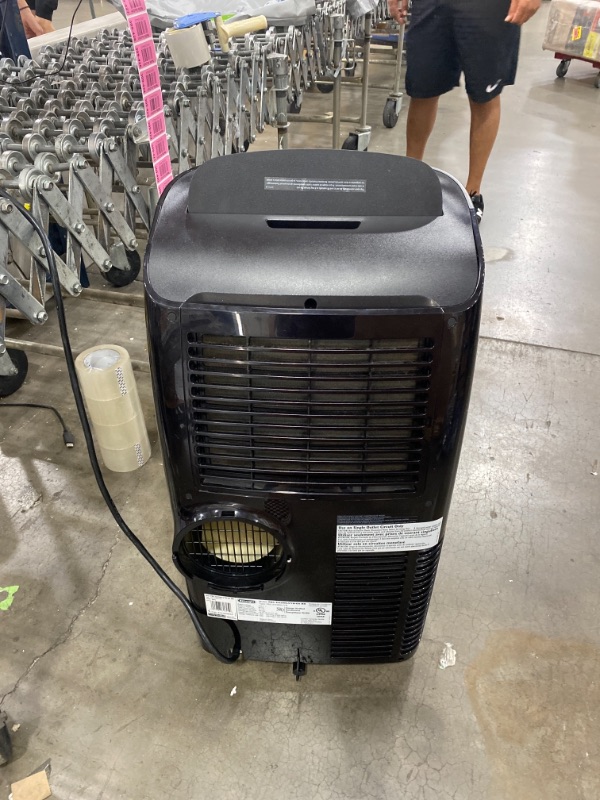 Photo 3 of De'Longhi 14000 BTU Portable Air Conditioner, Dehumidifier & Fan + Cool Surround Remote w/Built-in Temperature Control Sensor & Quiet Mode, 700 sq ft, XLarge Room, Pinguino 8600 BTU (DOE), Black AS IS USED, MINOR COSMETIC WEAR FROM PREVIOUS USE 
