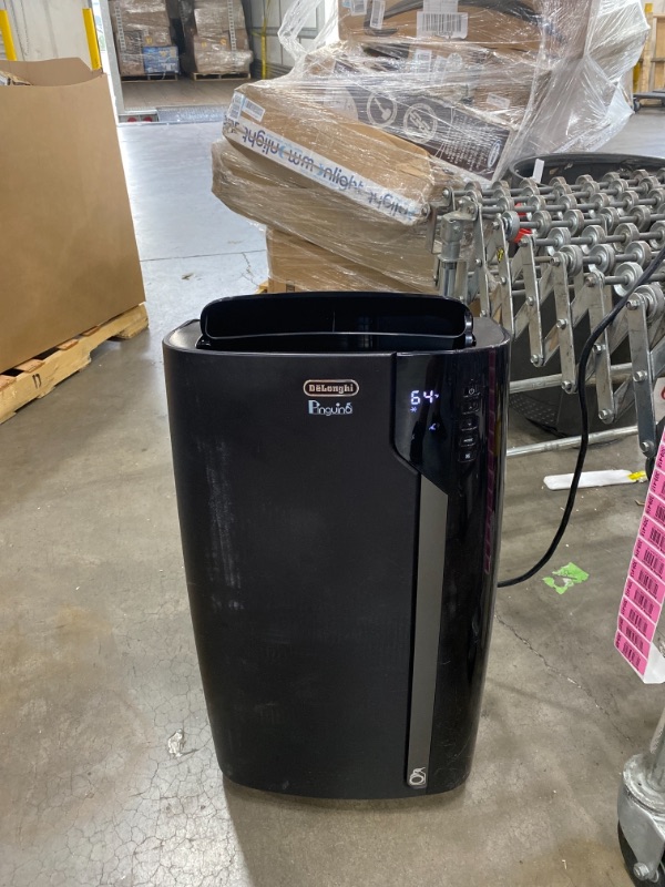 Photo 2 of De'Longhi 14000 BTU Portable Air Conditioner, Dehumidifier & Fan + Cool Surround Remote w/Built-in Temperature Control Sensor & Quiet Mode, 700 sq ft, XLarge Room, Pinguino 8600 BTU (DOE), Black AS IS USED, MINOR COSMETIC WEAR FROM PREVIOUS USE 
