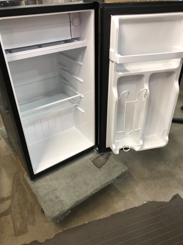 Photo 3 of *USED*
BLACK+DECKER BCRK32B Compact Refrigerator Energy Star Single Door Mini Fridge with Freezer, 3.2 Cubic Feet, Black (DAMAGE, Parts only)
