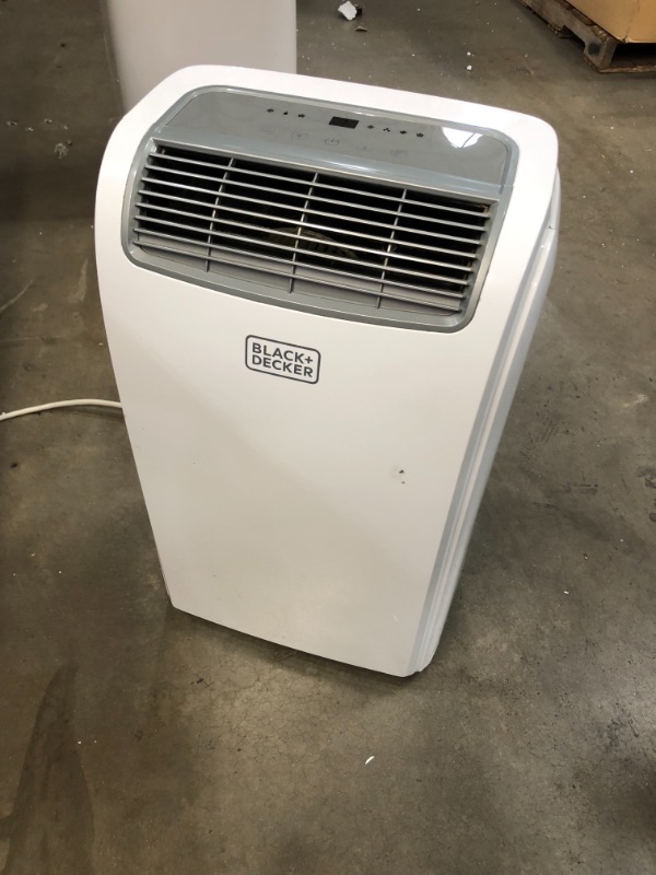 Photo 2 of *USED*
*MISSING manual and hardware* 
BLACK+DECKER BPACT10WT Portable Air Conditioner with Remote Control, 10,000 BTU, Cools Up to 250 Square Feet, White
