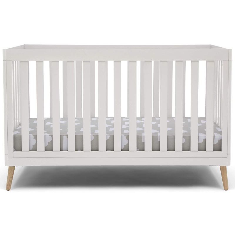 Photo 1 of Delta Children Essex 4-in-1 Convertible Crib - Bianca White with Natural Legs, 54" L x 29.50" D x 34" H