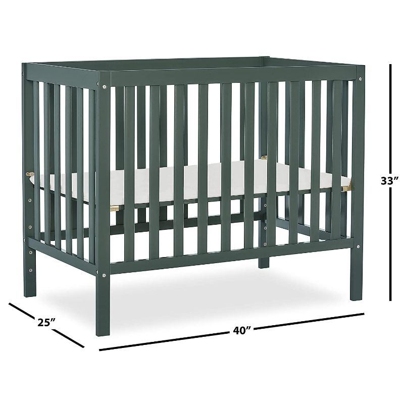 Photo 1 of *SEE last picture for damage*
Dream On Me Edgewood 4-in-1 Convertible Mini Crib, Olive