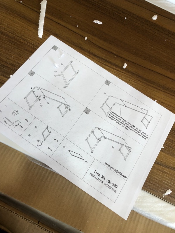 Photo 5 of SAFCO tigerdad-overbed table 5203
**LOOSE AND MISSING HARDWARE, MINOR COSMETIC DAMAGE**