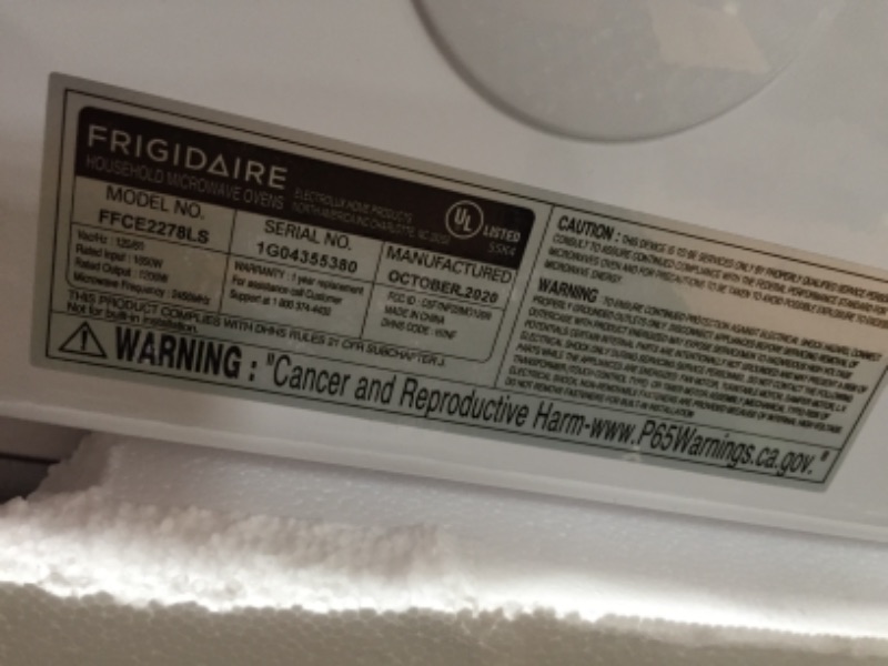 Photo 4 of Frigidaire 2.2 Cu. Ft. 1200 Watt Countertop Microwave Oven - Stainless Steel FFCE2278LS
**DAMAGED, DENT**