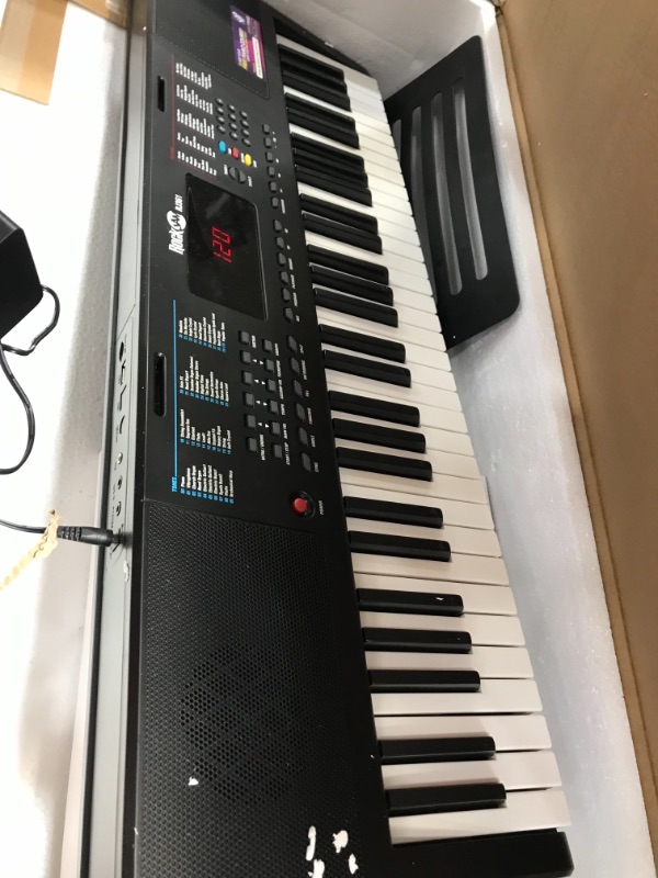 Photo 3 of RockJam 61 Portable Electronic Keyboard with Key Note Stickers, Power Supply and Simply Piano App Content, Compact (RJ361)
