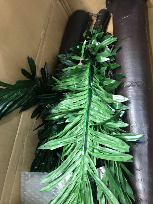 Photo 1 of 7 ft. Pre-Lit LED Palm Artificial Christmas Tree with Green Leaves and 96 LED Lights,, Size: 35.4 x 14.4 x 5.1 inches