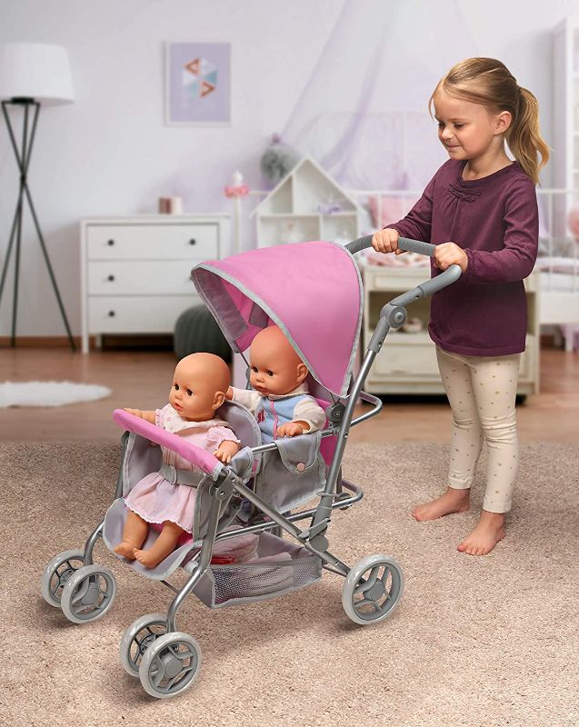 Photo 1 of Badger Basket Cruise Twin Folding Inline Double Doll Stroller (fits American Girl Dolls),, Overall Size 23 inches L x 14. 5 inches W x 26 inches H,, PINK / GRAY