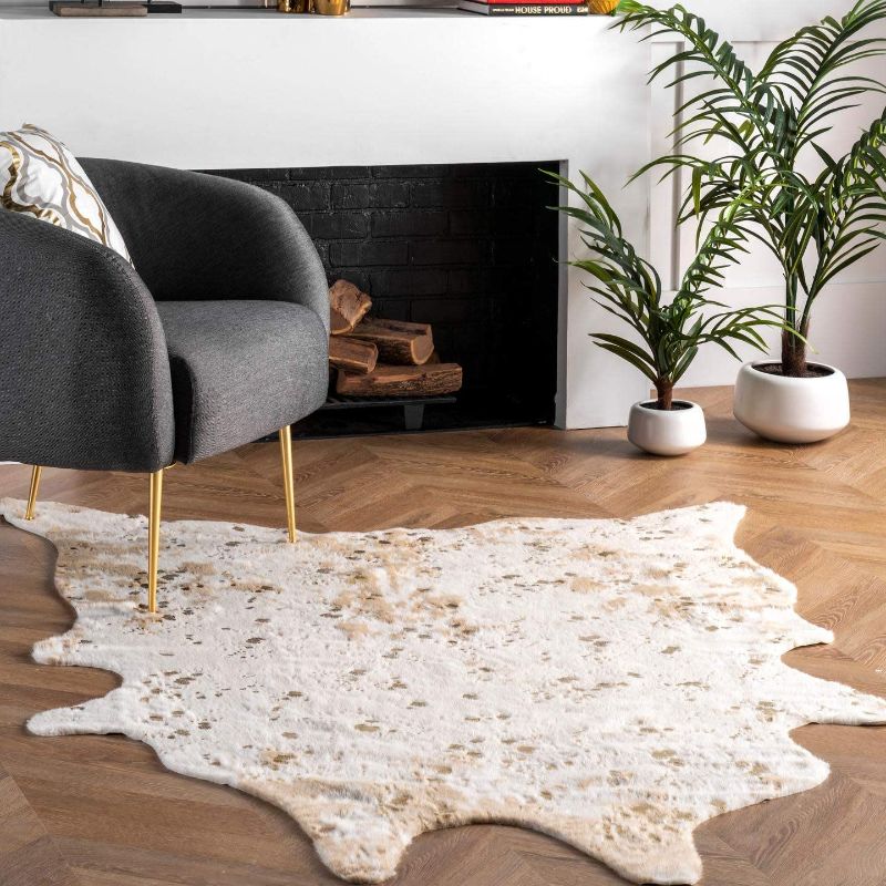 Photo 1 of nuLOOM Iraida Faux Cowhide Shaped Rug, 5' 9" x 7' 7", Off-white
