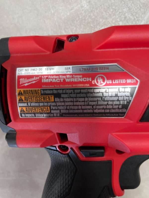 Photo 4 of 1/2" Drive 18 Volt Pistol Grip Cordless Impact Wrench & Ratchet with MILWAUKEE'S 48-11-1850 M18 Redlithium 5.0Ah Bat Pack
