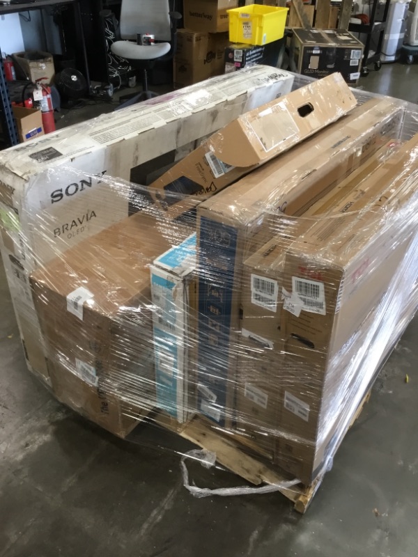 Photo 1 of Pallet of assorted broken TVs and monitors