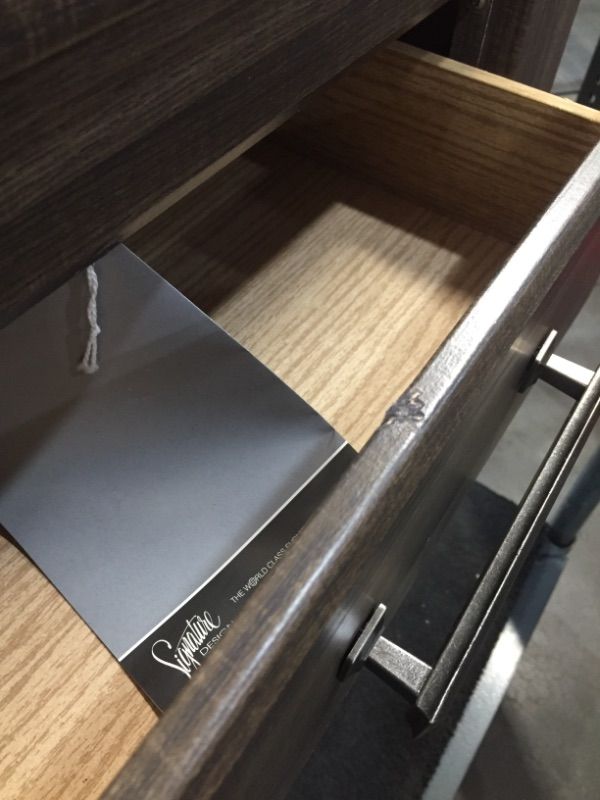 Photo 1 of Ashley Furniture Signature Design - Juararo Nightstand - 2 Drawer - Rectangular - Dark Brown