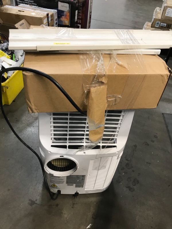 Photo 1 of HONEYWELL
14,000 BTU (10,000 BTU DOE) Portable Air Conditioner with Dehumidifier in White

