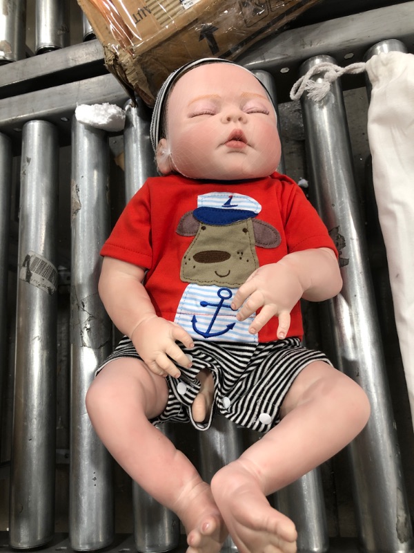 Photo 2 of DOLL REBORN - BABY BOY INCLUDED WITH A BOTTLE, BINKY, AND DIAPERS