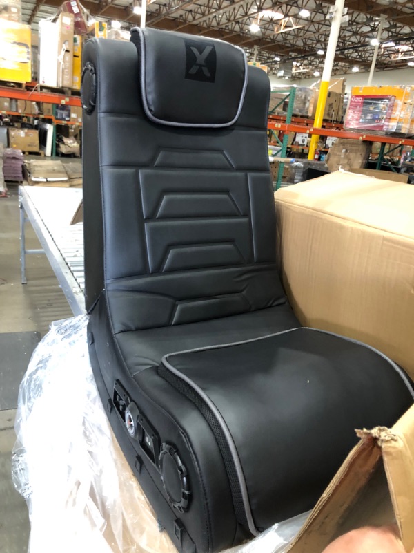 Photo 5 of X Rocker Pro Series H3 Black Leather Vibrating Floor Video Gaming Chair with Headrest for Adult, Teen, and Kid Gamers - 4.1 High Tech Audio and Wireless Capacity - Foldable and Ergonomic Back Support
