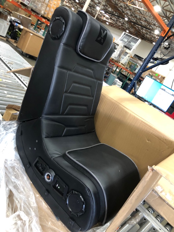 Photo 2 of X Rocker Pro Series H3 Black Leather Vibrating Floor Video Gaming Chair with Headrest for Adult, Teen, and Kid Gamers - 4.1 High Tech Audio and Wireless Capacity - Foldable and Ergonomic Back Support
