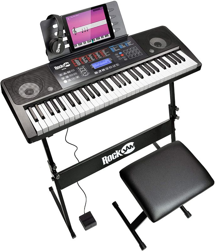 Photo 1 of RockJam 61 Key Keyboard Piano With Touch Display Kit, Keyboard Stand, Piano Bench, Sustain Pedal, Headphones, Simply Piano App & Keynote Stickers
