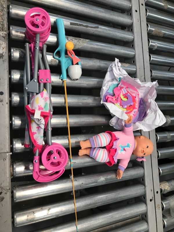 Photo 1 of **Little Girl Bundle**
Includes Doll and Doll Stroller
Moana Fishing pole
AS IS NO RETURNS