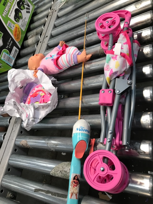 Photo 2 of **Little Girl Bundle**
Includes Doll and Doll Stroller
Moana Fishing pole
AS IS NO RETURNS