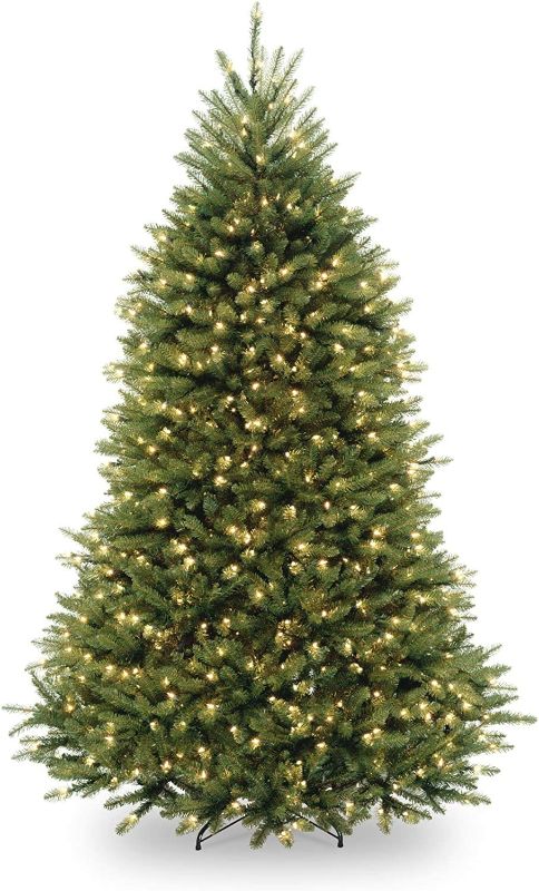 Photo 1 of National Tree Company Pre-Lit Artificial Full Christmas Tree, Green, Dunhill Fir, White Lights, Includes Stand, 6.5 Feet
