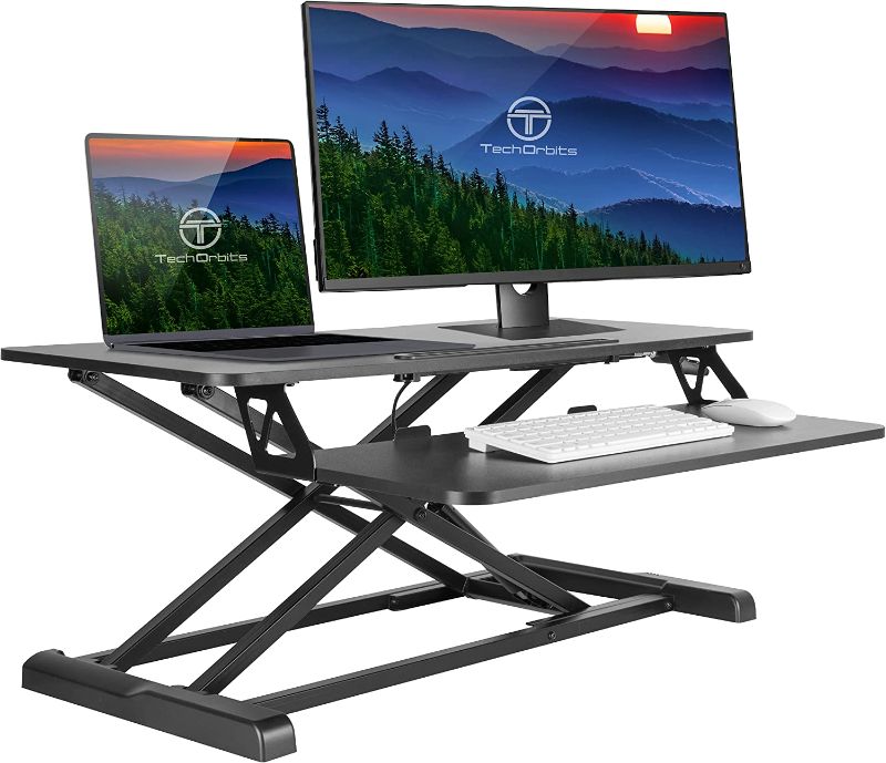 Photo 1 of TechOrbits Standing Desk Converter - 32-inch Height Adjustable, Particle Board, Sit-to-Stand Desk Risers for Dual Monitor Workstation - Home Office Accessories - Black
