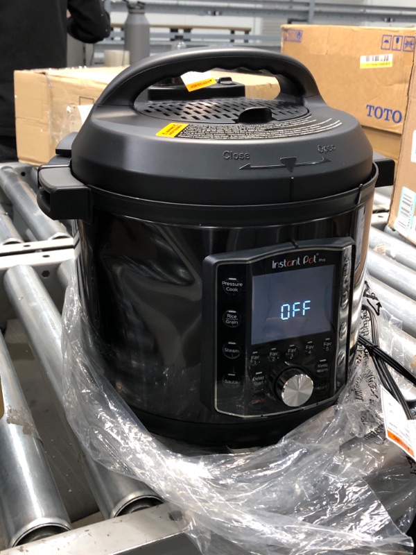 Photo 1 of Instant Pot Pro 10-in-1 Pressure Cooker, Slow Cooker, Rice/Grain Cooker, Steamer, Sauté, Sous Vide, Yogurt Maker, Sterilizer, and Warmer, 6 Quart 13 x 12.7 x 12.8 inches

