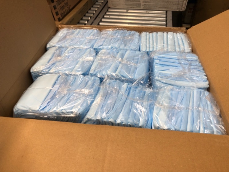 Photo 1 of Medline - MSC281236P Moderate Absorbency 23" x 36" Fluff Disposable Underpads, 150 Per Case, Great for Protecting Bed, Furniture, Surfaces
