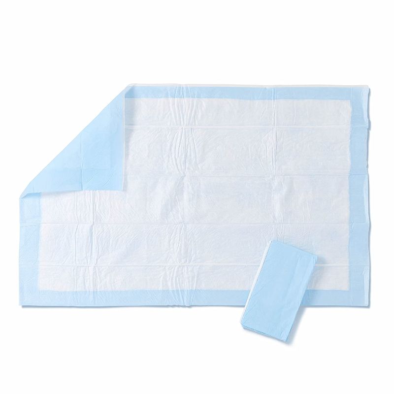 Photo 1 of Medline - MSC281236P Moderate Absorbency 23" x 36" Fluff Disposable Underpads, 150 Per Case, Great for Protecting Bed, Furniture, Surfaces

