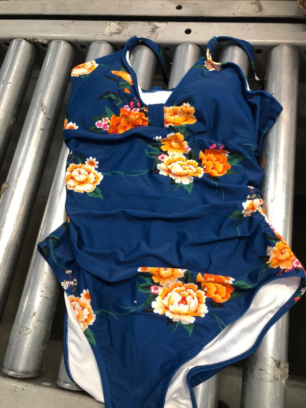 Photo 2 of Blue Floral Cutout One Piece Swimsuit (XL)
(LOOKS SMALLER THAN AN XL )