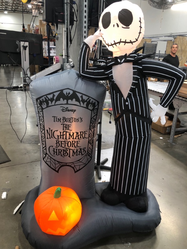 Photo 2 of 6 ft. LED Jack Skellington with Tombstone Airblown Disney Halloween Inflatable