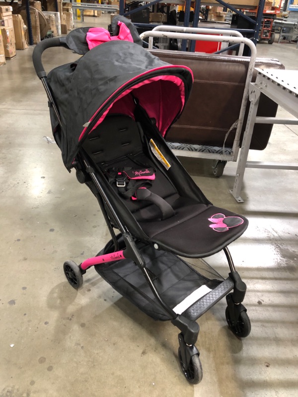 Photo 2 of Disney Baby® Minnie Mouse Ultra Compact Single Stroller in Pink ?24.38 x 18.25 x 10.5 inches

 
