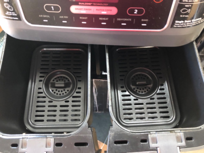 Photo 1 of Ninja DZ201 Foodi 8 Quart 6-in-1 DualZone 2-Basket Air Fryer with 2 Independent Frying Baskets