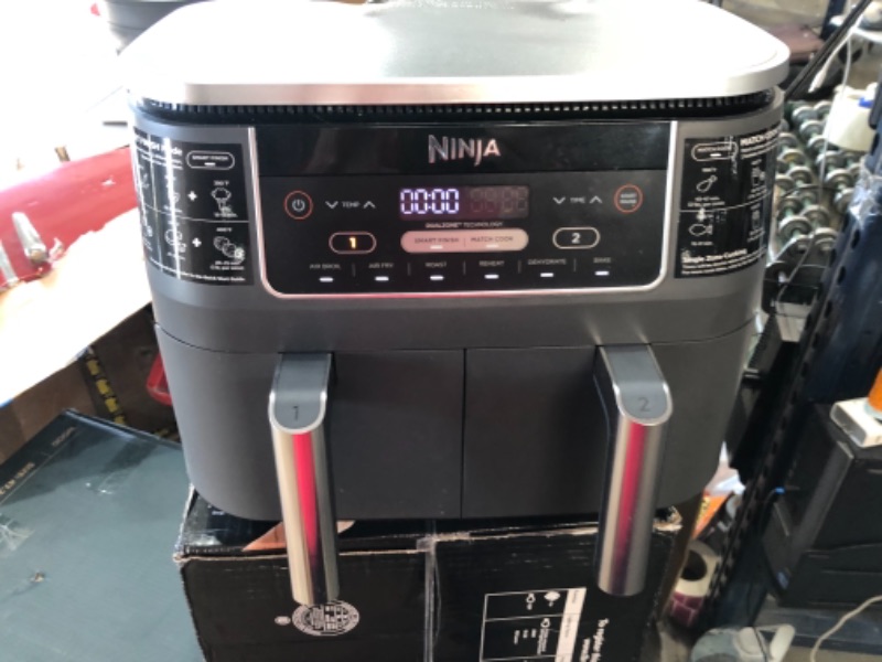 Photo 1 of Ninja DZ201 Foodi 8 Quart 6-in-1 DualZone 2-Basket Air Fryer with 2 Independent Frying Baskets
