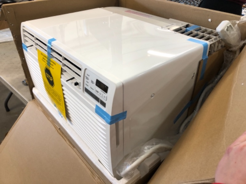 Photo 1 of 11,200 BTU 230-Volt Through-the-Wall Air Conditioner LT1237HNR with Heat and Remote in White
