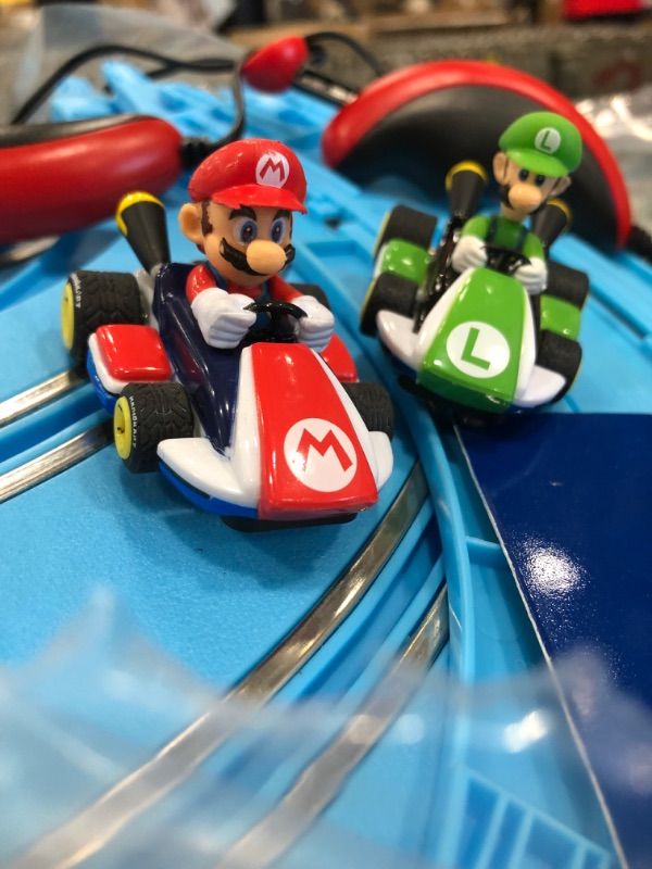 Photo 2 of **ONE REMOTE IS BROKEN*** Carrera First MarioKart Racing Set
