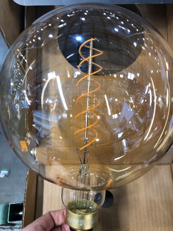 Photo 2 of Feit Electric 60-Watt Equivalent G63 Dimmable Spiral Filament Oversized Amber Glass E26 Vintage Edison LED Light Bulb, Warm White
