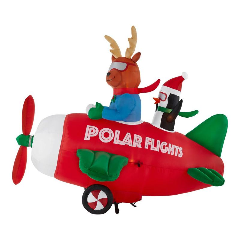 Photo 1 of Home Accents Holiday 7 Ft Pre-Lit LED Animated Airblown Polar Flights Airplane Scene Christmas Inflatable
