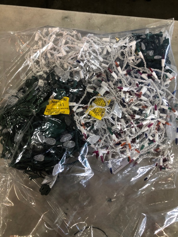 Photo 1 of *SOLD AS IS*
BAG OF ASSORTED HALF WORKING ASSORTED CHRISTMAS LIGHTS 
