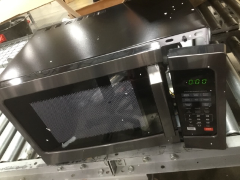 Photo 2 of ***NON-FUNCTIONAL PARTS ONLY***
Toshiba EM131A5C-BS Microwave Oven with Smart Sensor, Easy Clean Interior, ECO Mode and Sound On/Off, 1.2 Cu Ft, Black Stainless Steel
