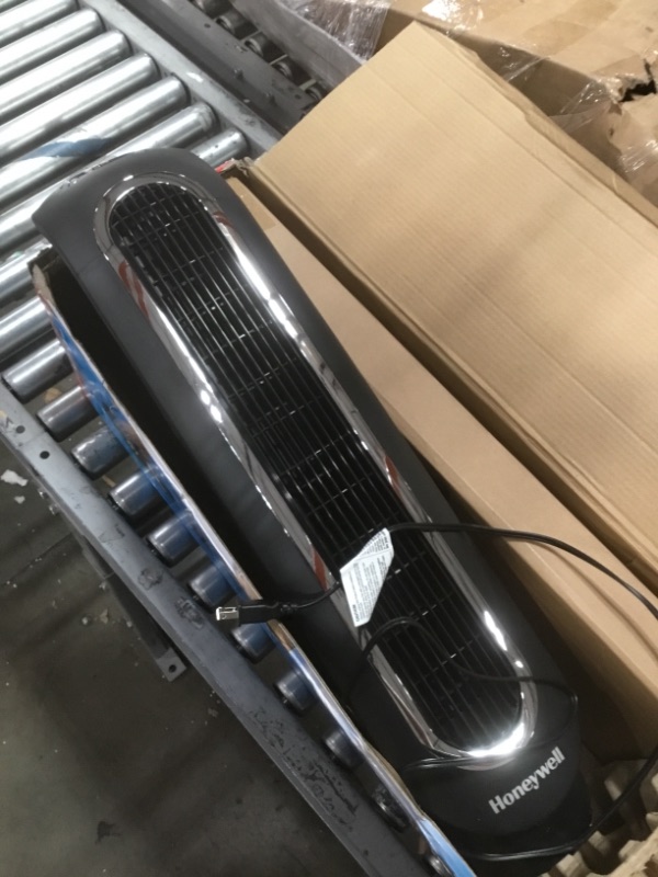 Photo 1 of **NON-FUNCTIONAL; PARTS ONLY**
Honeywell HYF048 Fresh Breeze Tower Fan with Remote Control
