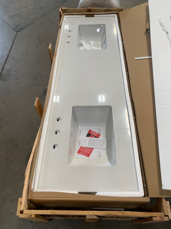 Photo 1 of 73 in. W x 22 in. D Engineered Marble Double Trough Sink Vanity Top in Winter White
as is minor damage - scratch on one side of the top 