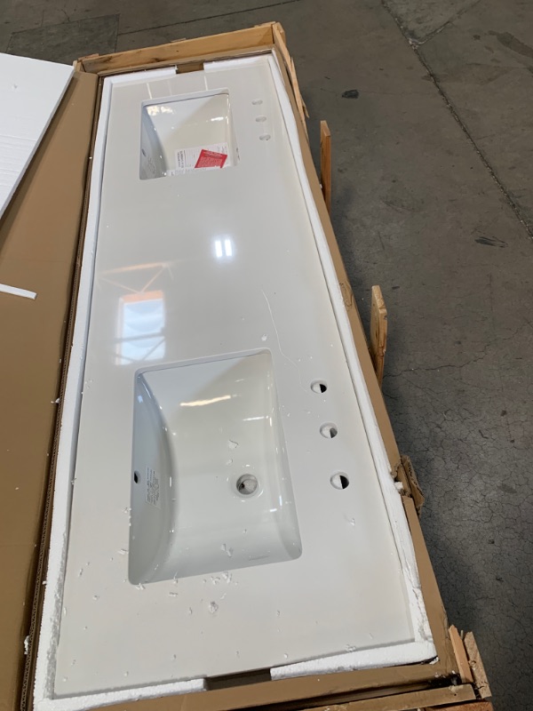 Photo 1 of 73 in. W x 22 in. D Engineered Marble Double Trough Sink Vanity Top in Winter White
as is minor damage - scratch on one side of the top 