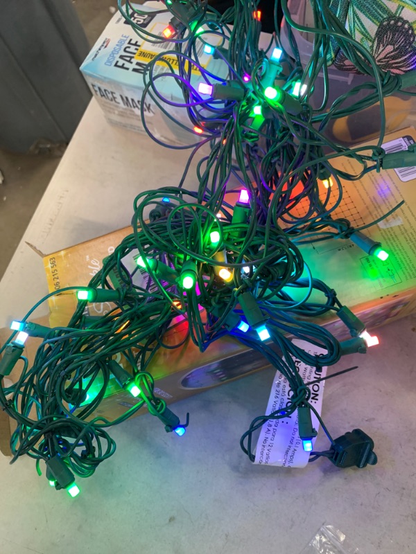 Photo 2 of 48 in. H x 66 in. W 72-Light LuxeSparkle Multi Color Christmas Net Light with Green Wire
AS IS TESTED WORKING 