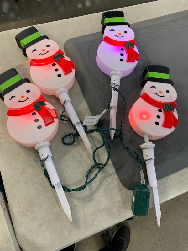 Photo 2 of 20 in. Christmas ColorMotion Snowman Pathway Stakes (Set of 4)
