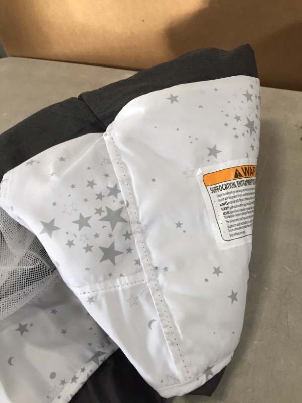 Photo 5 of Evolur Stellar Bassinet and Bedside Sleeper, Black WITH STARS 
AS IS USED