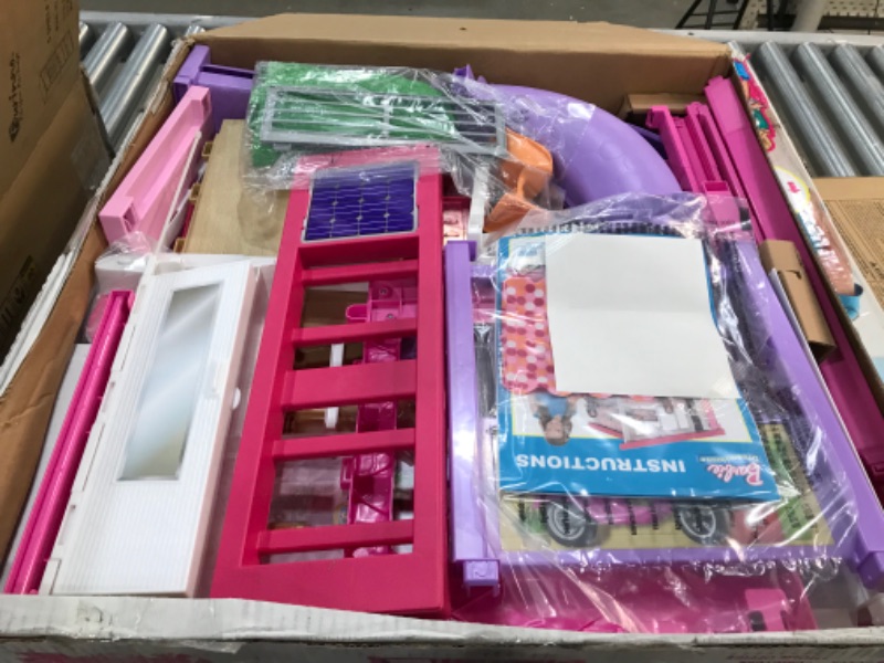 Photo 2 of Barbie Dreamhouse Dollhouse with Wheelchair Accessible Elevator, Pool, Slide and 70 Accessories Including Furniture and Household Items, Gift for 3 to 7 Year Olds
